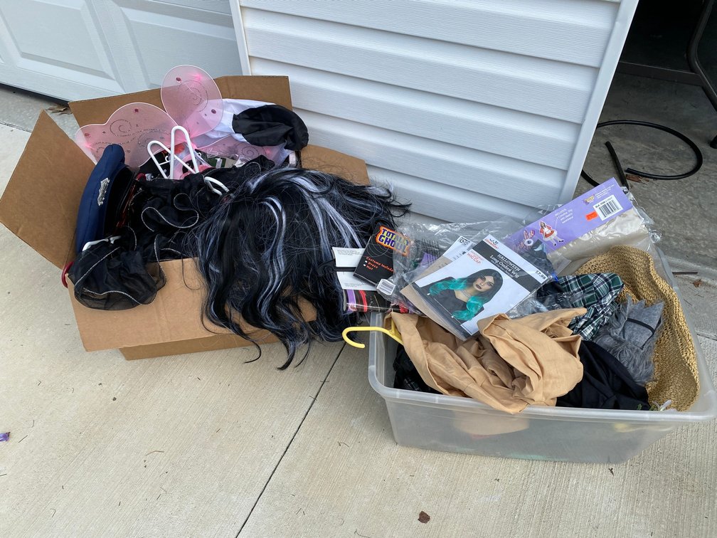 2 Boxes of Halloween costumes