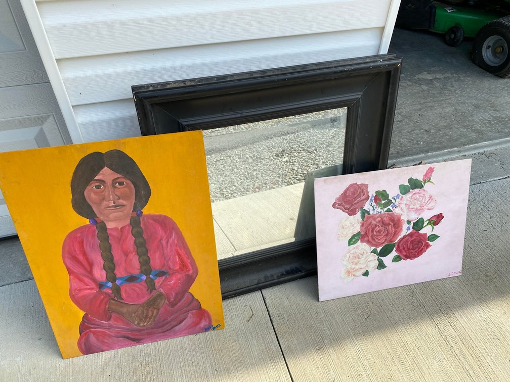 2 Painted pictures and mirror that needs cleaning