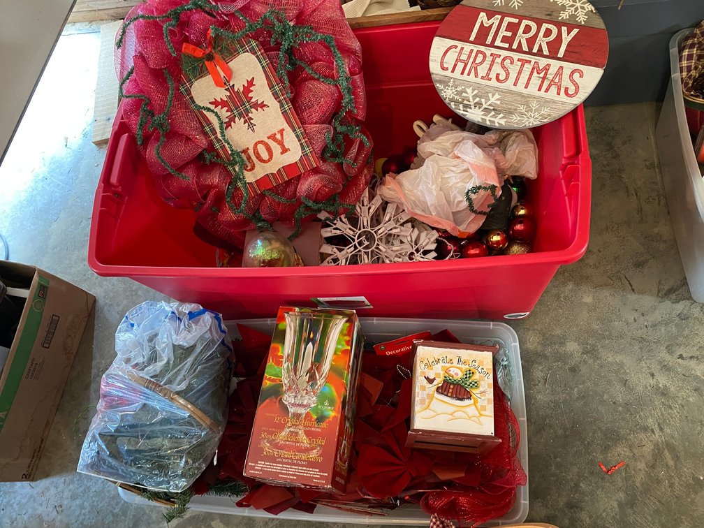 2 Totes of Christmas and decorative items-snowflake lights, misc. ornaments, snow globe with 3 Wise Men and Baby Jesus, 12" Crystal hurricane glass, baskets, other decorations