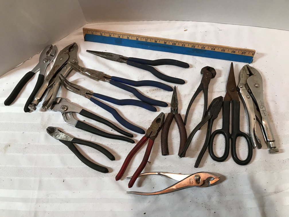 Assorted pliers, tin snips and vise grips
