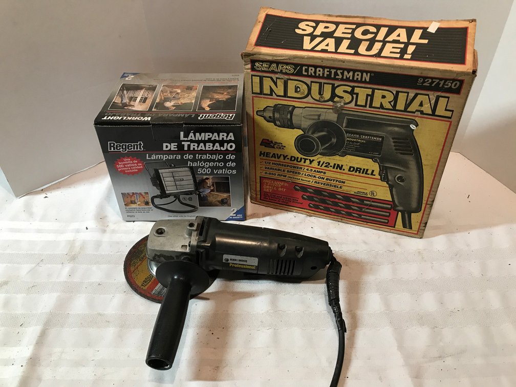 Drill, angle grinder and work light