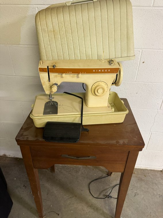 Singer sewing machine, end table