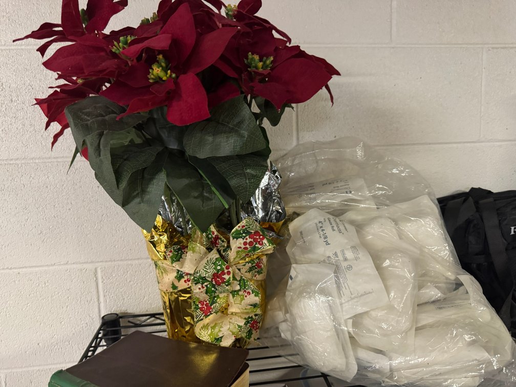 Floral decorations, bag, gauze rolls