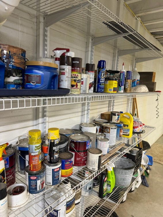 Collection of painting supplies, caulk wood finisher, other items