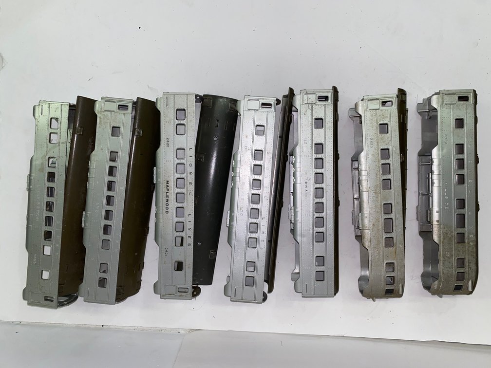 vintage Lionel 2400-series passenger car features a silver finish