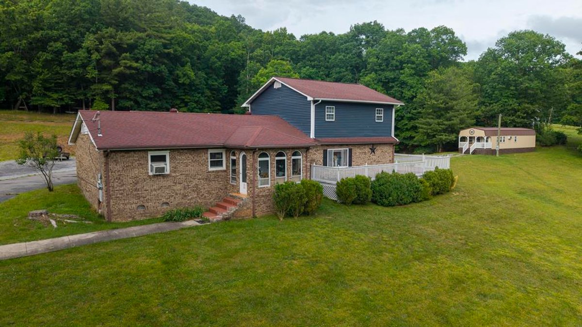 Image for SOLD $277,750 - Private 6.82 Acre Homestead with Updated Home, Cabin, & more in Daniels