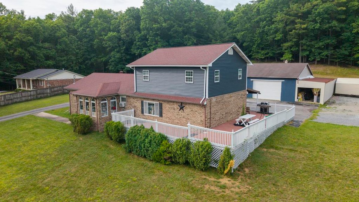 Image for SOLD $277,750 - Private 6.82 Acre Homestead with Updated Home, Cabin, & more in Daniels