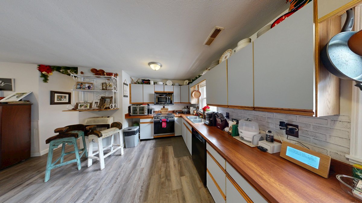 Image for SOLD $277,750 - Private 6.82 Acre Homestead with Updated Home, Cabin, & more in Daniels