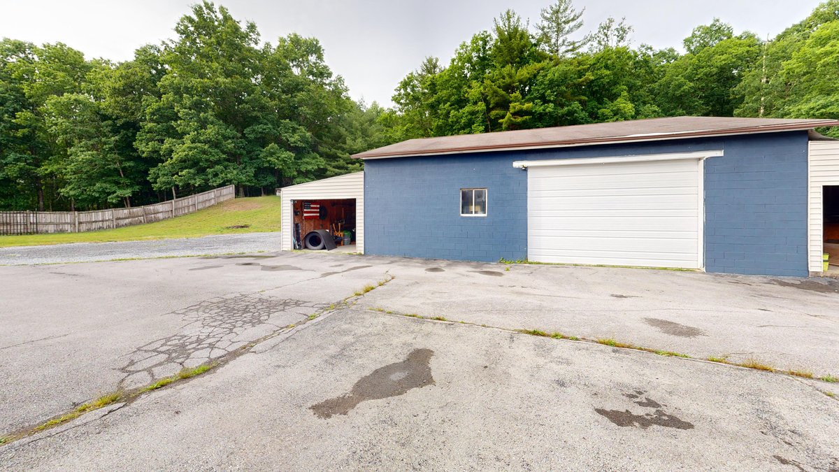 Image for SOLD $277,750 - Private 6.82 Acre Homestead with Updated Home, Cabin, & more in Daniels