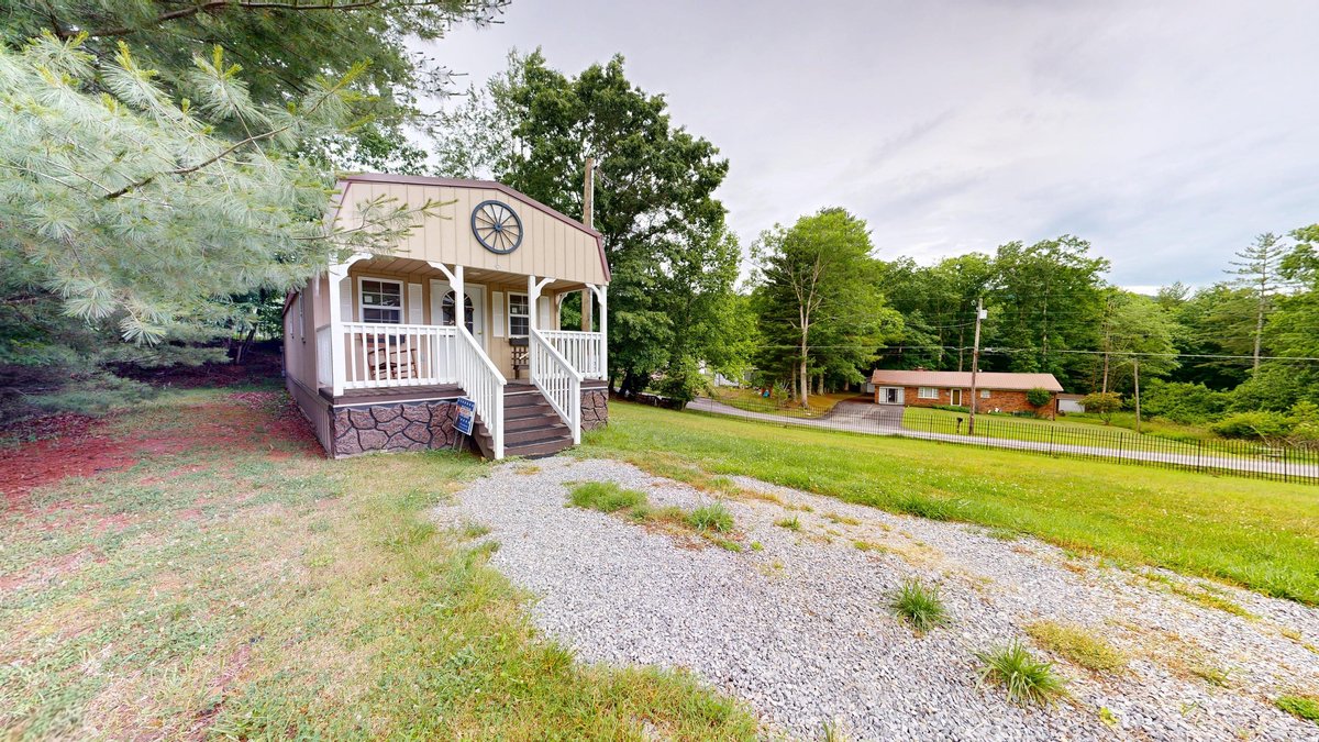 Image for SOLD $277,750 - Private 6.82 Acre Homestead with Updated Home, Cabin, & more in Daniels