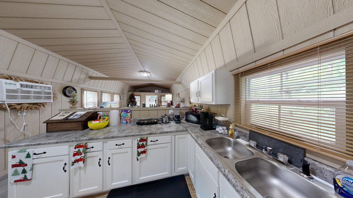 Image for SOLD $277,750 - Private 6.82 Acre Homestead with Updated Home, Cabin, & more in Daniels