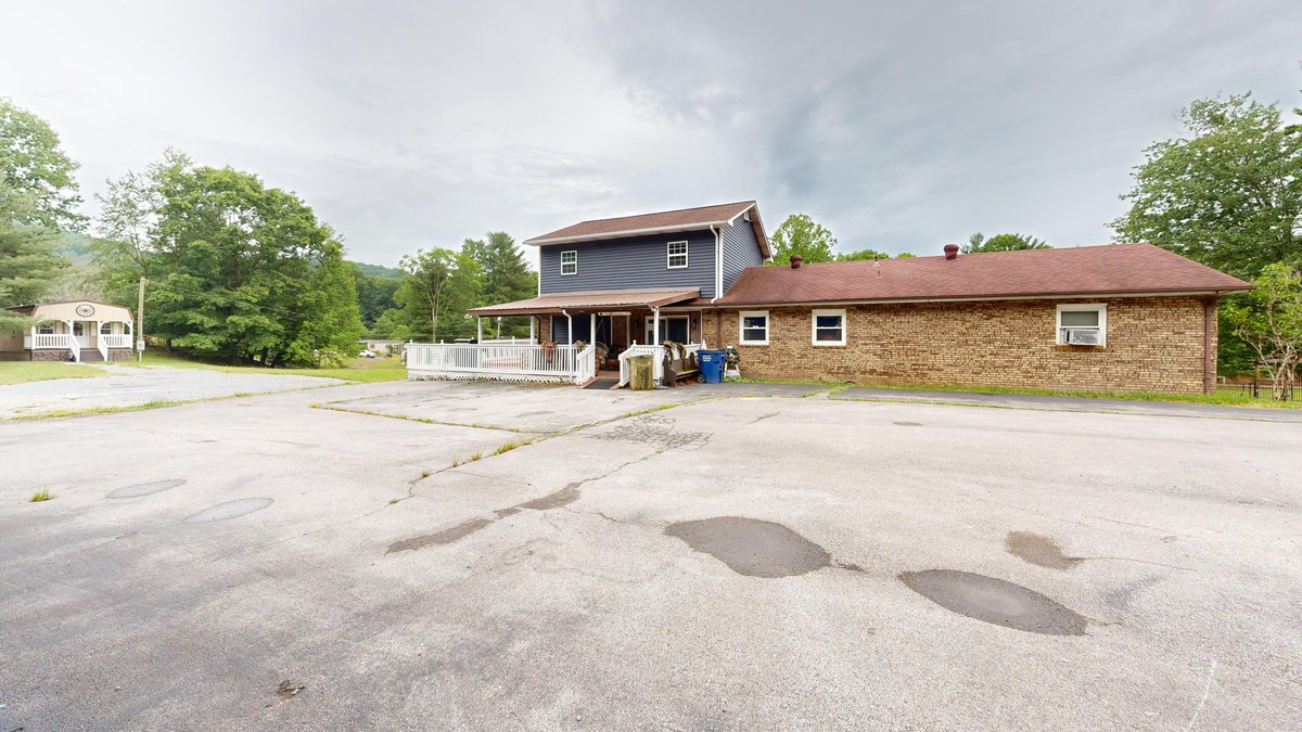 Image for SOLD $277,750 - Private 6.82 Acre Homestead with Updated Home, Cabin, & more in Daniels