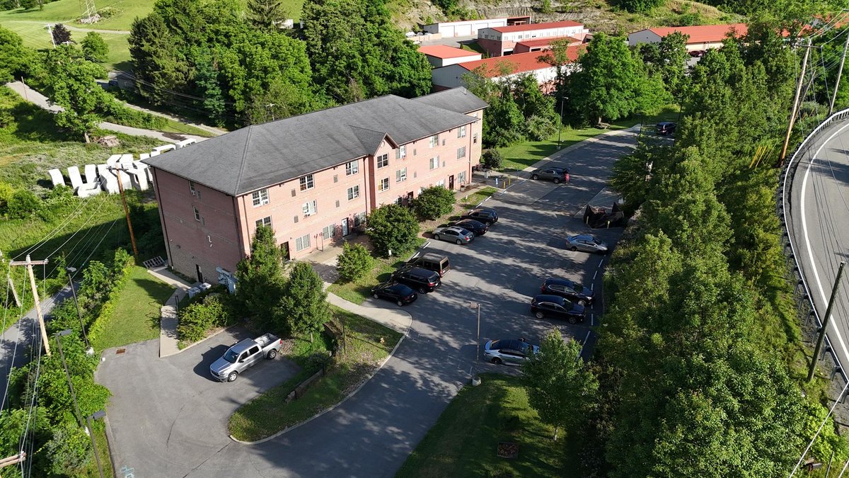 Image for SOLD $1,430,000 - Four Story Brick Apartment Building and Quadplex on 3.13 Acres in Morgantown