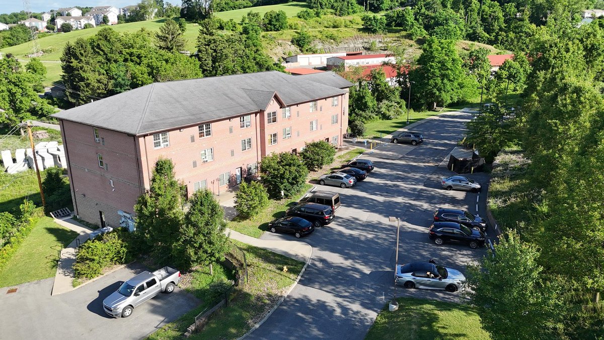 Image for SOLD $1,430,000 - Four Story Brick Apartment Building and Quadplex on 3.13 Acres in Morgantown