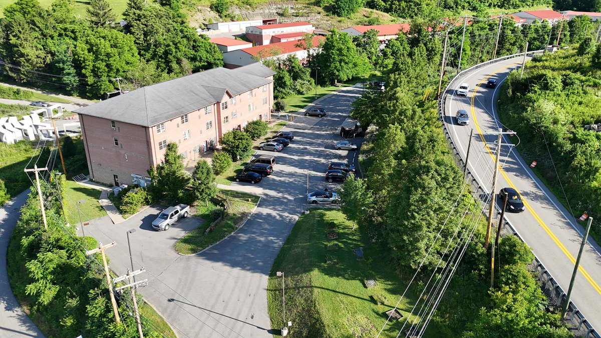 Image for SOLD $1,430,000 - Four Story Brick Apartment Building and Quadplex on 3.13 Acres in Morgantown