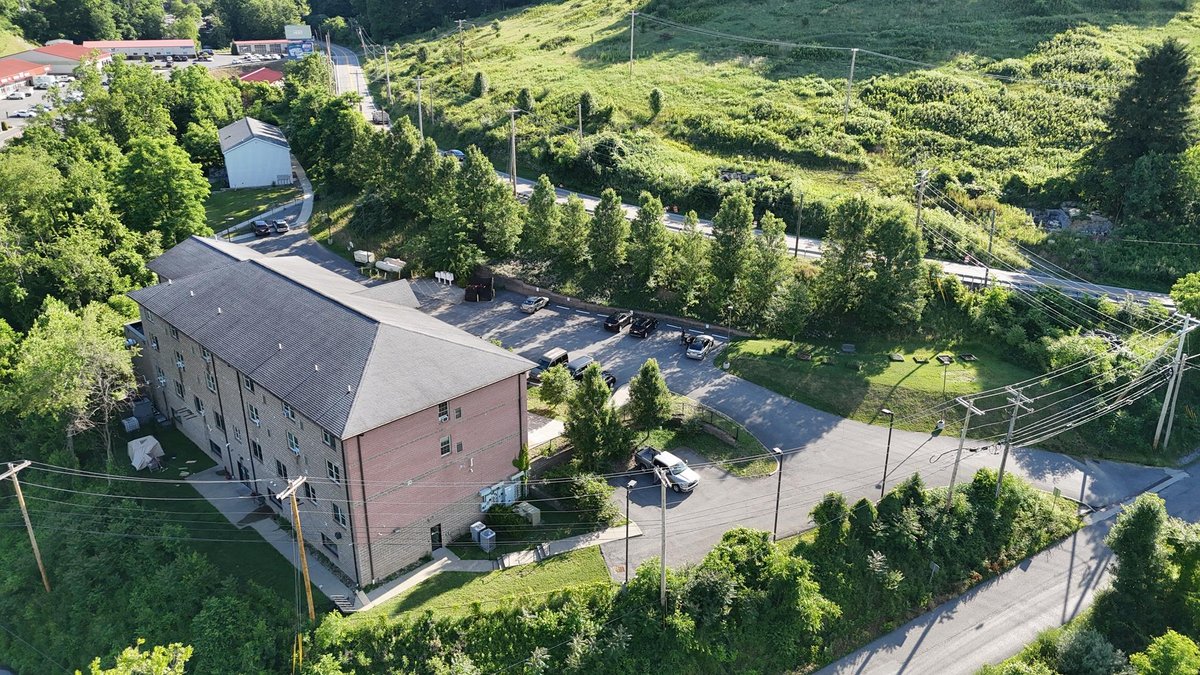 Image for SOLD $1,430,000 - Four Story Brick Apartment Building and Quadplex on 3.13 Acres in Morgantown
