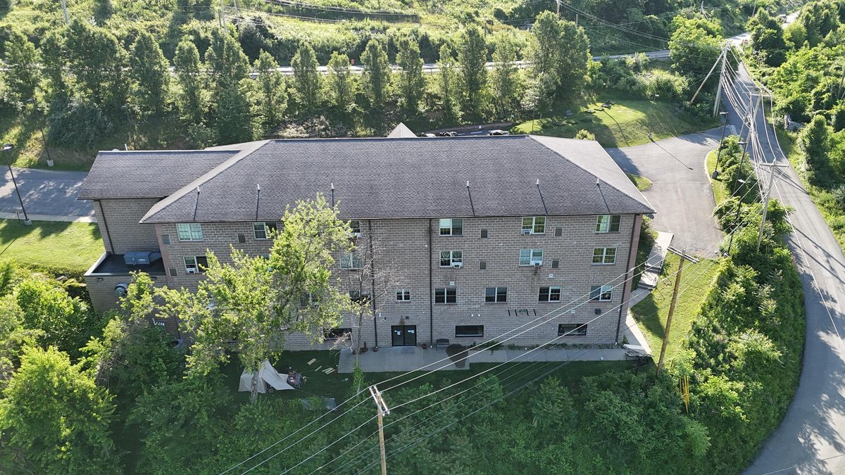 Image for SOLD $1,430,000 - Four Story Brick Apartment Building and Quadplex on 3.13 Acres in Morgantown