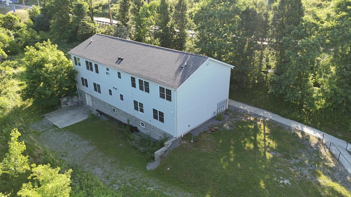 Image for SOLD $1,430,000 - Four Story Brick Apartment Building and Quadplex on 3.13 Acres in Morgantown
