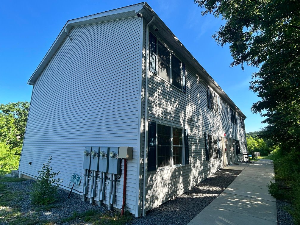 Image for SOLD $1,430,000 - Four Story Brick Apartment Building and Quadplex on 3.13 Acres in Morgantown
