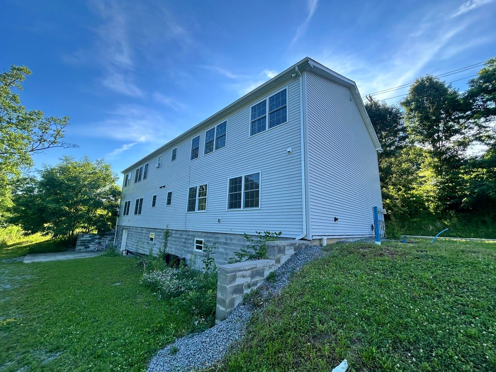 Image for SOLD $1,430,000 - Four Story Brick Apartment Building and Quadplex on 3.13 Acres in Morgantown