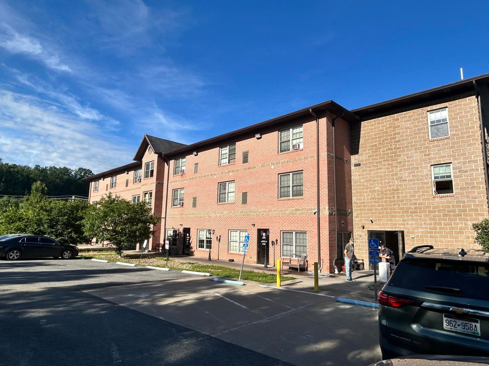 Image for SOLD $1,430,000 - Four Story Brick Apartment Building and Quadplex on 3.13 Acres in Morgantown