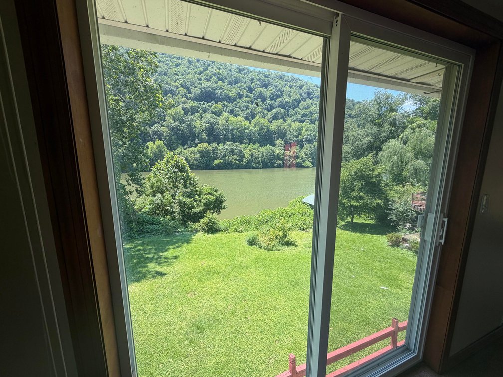 Image for SOLD $83,600 - Spacious 5 Bedroom Riverfront Home in Kanawha County
