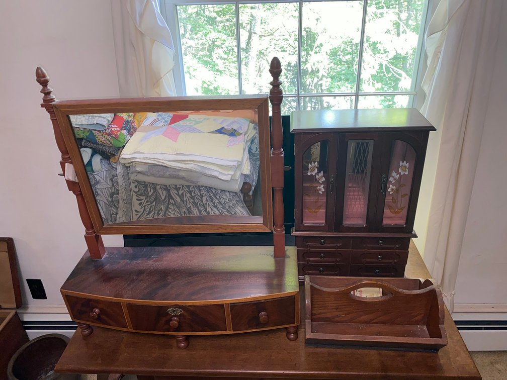 Vintage vanity, wooden jewelry armoire featuring etched floral glass doors and multiple lower drawers