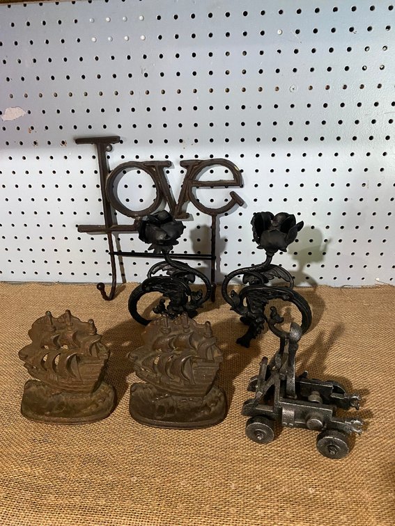 Bookends, cast iron candle holders