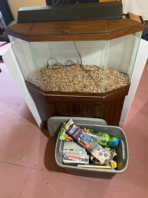 Approx. 20 gallon fish tank on stand with supplies