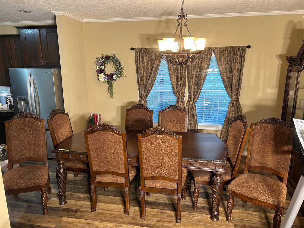 Ornate dining Table with 8 Chairs and 2 Leaves