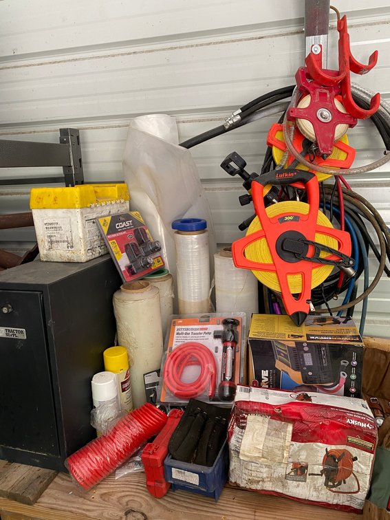 Collection of Saran Wrap, Multi Use Transfer Pump, Stihl Air Hose Reel, Air Hoses