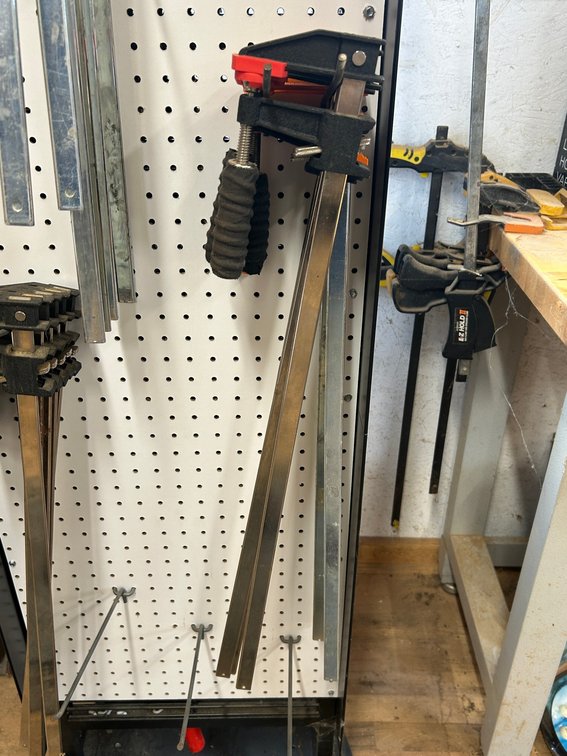 Several metal clamps