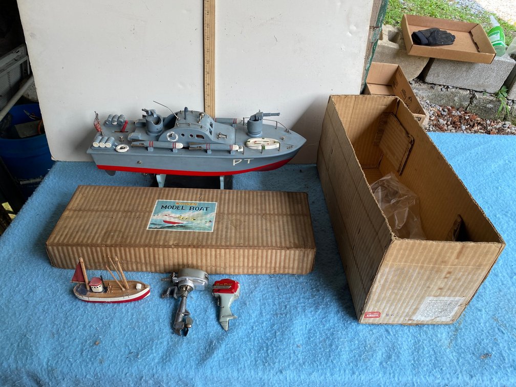 Toy boat in box with 2 small metal motors