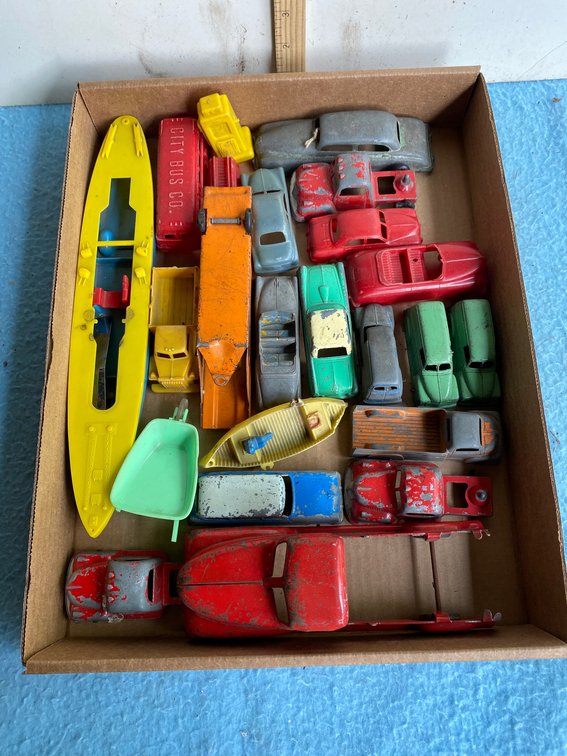 Vintage toy cars and boat