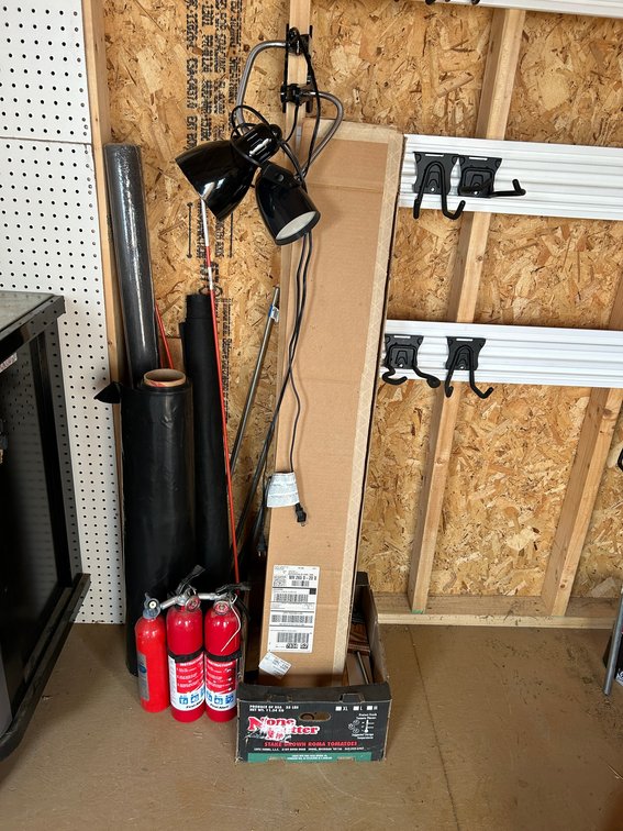 Non locking trolly ceiling track system for hanging tools, 2 hook lamps, fire extinguishers, landscaping cloth