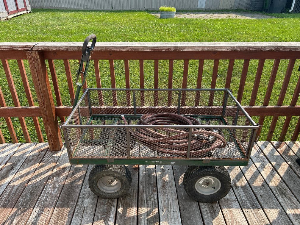 Outdoor lawn cart with hose