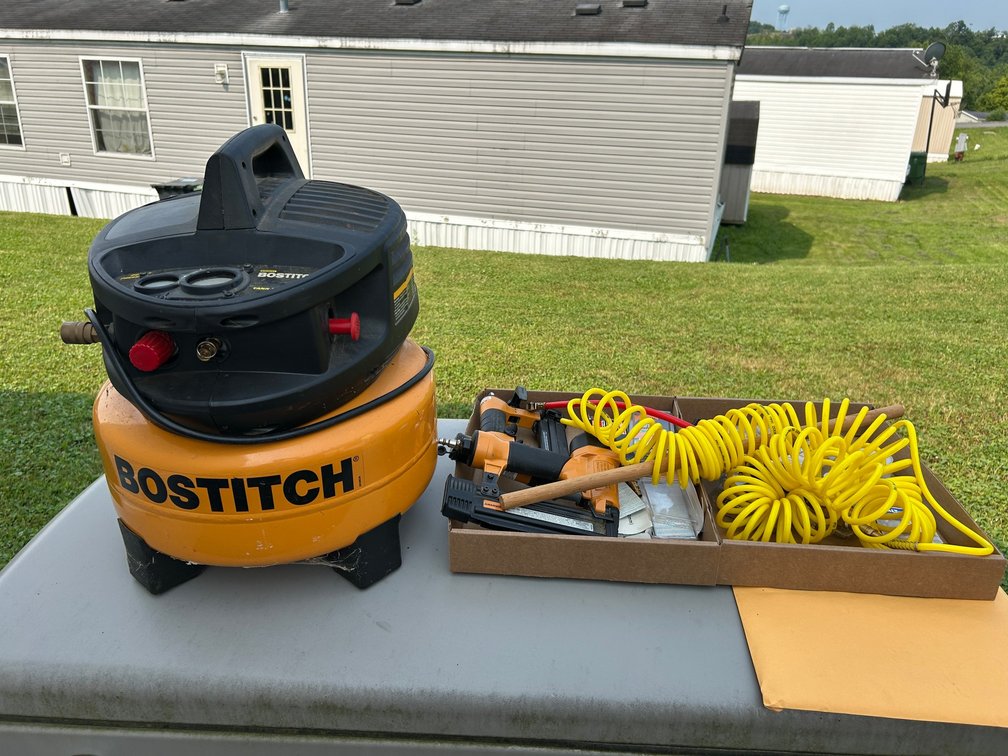 Bostitch air compressor and all accessories for air compressor, 2 Bostitch finish nail guns with finish nails