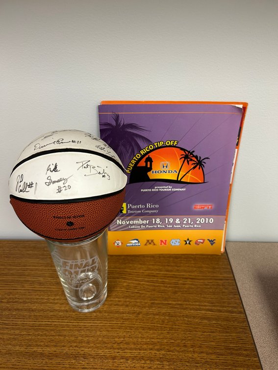 Miniature WVU signed basketball from the Puerto Rico tip off, Final Four glass
