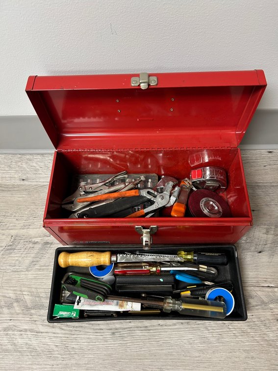 Metal toolbox with tools