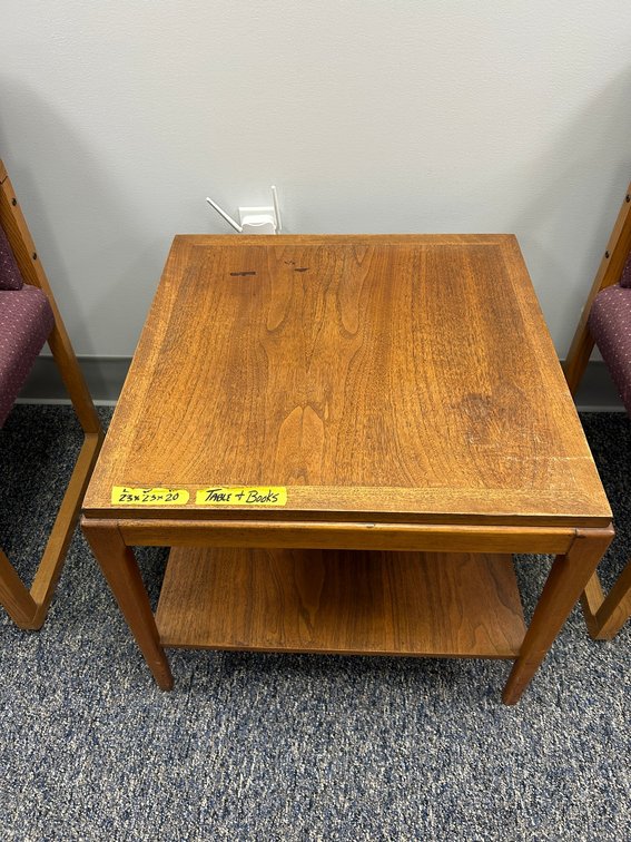Solid wood end table with magazines