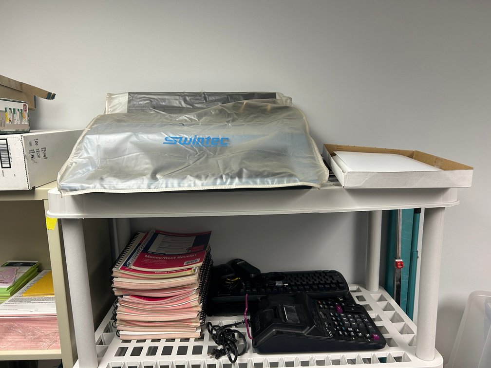 Receipt books, adding machine, keyboards, Swintech typewriter, misc.