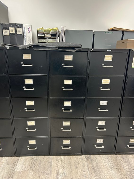 Three 5 drawer metal file cabinets contents on top NOT included