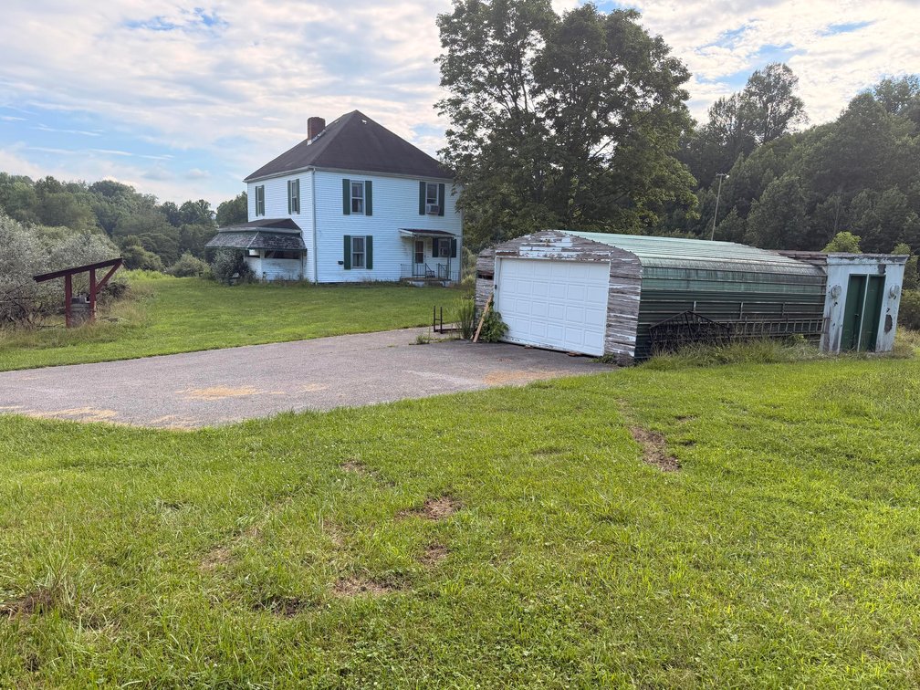 Image for Over 53 Acres with a Farmhouse & Pond Minutes from Charleston
