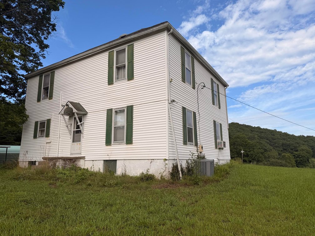 Image for Over 53 Acres with a Farmhouse & Pond Minutes from Charleston