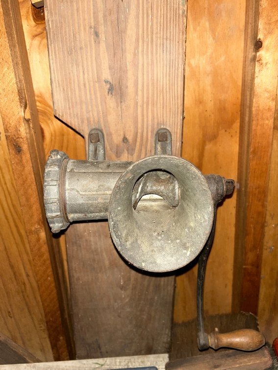 Meat Grinder Mounted on a Board
