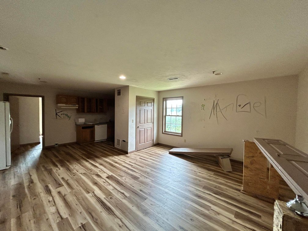 Image for SOLD $1,430,000 - Four Story Brick Apartment Building and Quadplex on 3.13 Acres in Morgantown