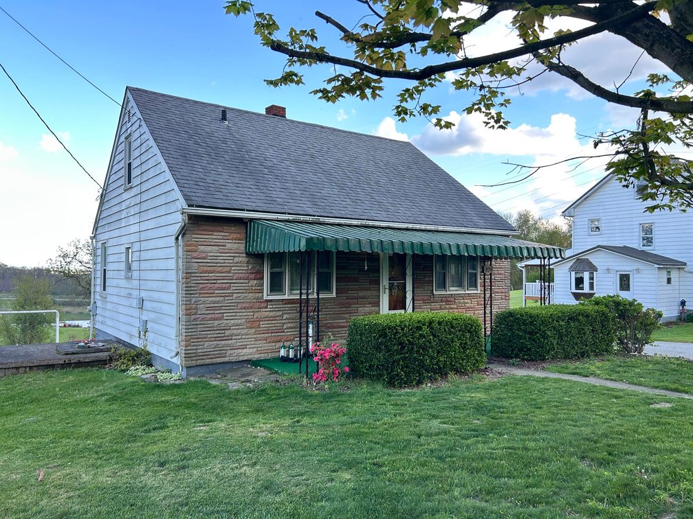 Image for SOLD $115,500 - 2 Bedroom Cape Cod on Nearly Half Acre in Washington