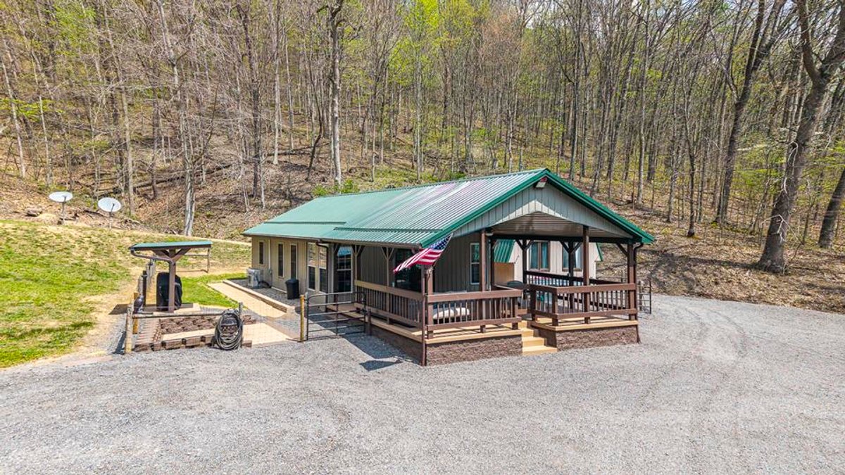 Image for SOLD $385,000 - Impressive Cabin with Guest House on 46 Acres in Harrison County