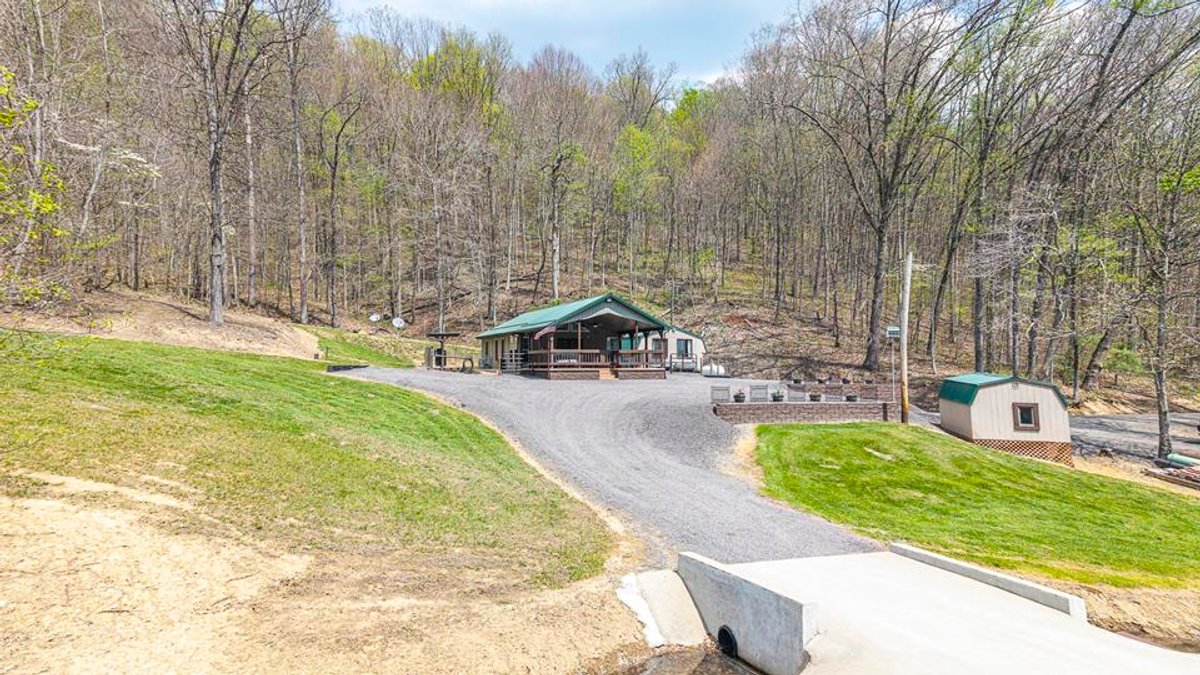 Image for SOLD $385,000 - Impressive Cabin with Guest House on 46 Acres in Harrison County