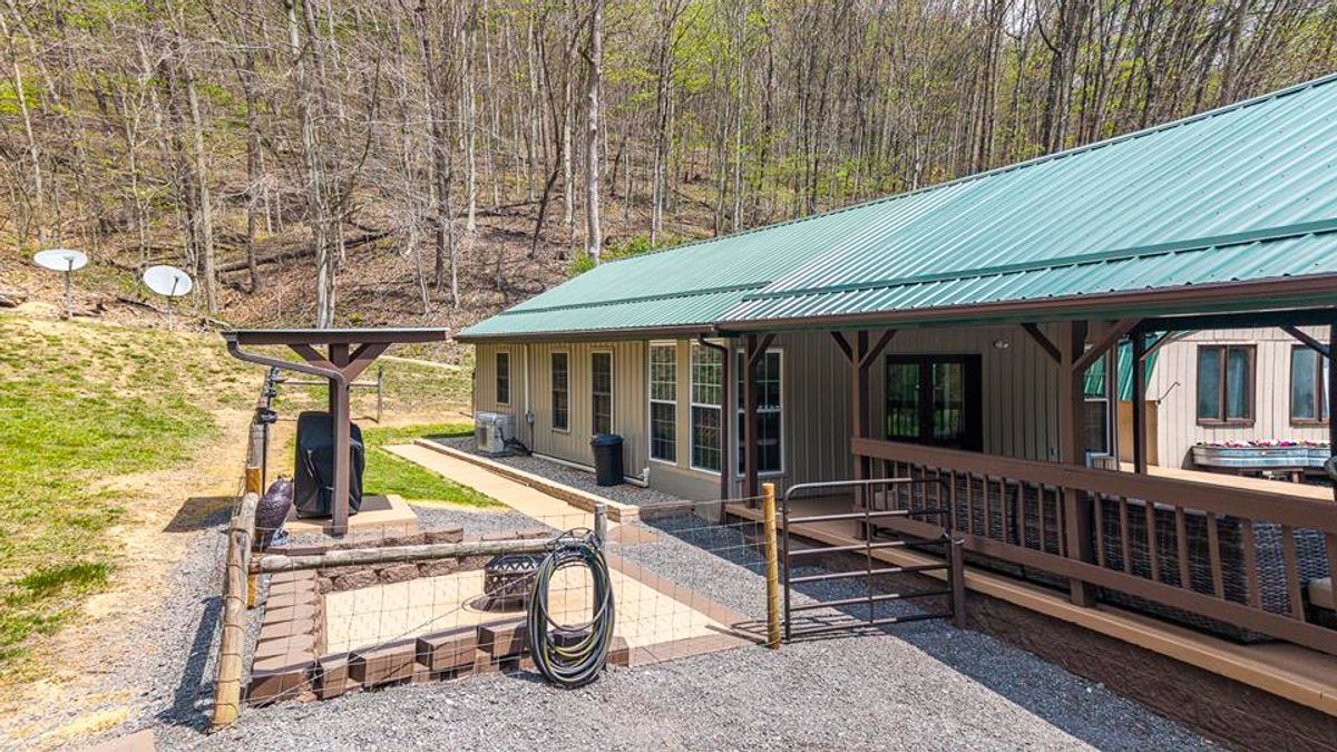 Image for SOLD $385,000 - Impressive Cabin with Guest House on 46 Acres in Harrison County